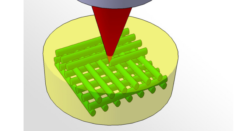 Illustration for article titled This microscopic 3-D pattern was "painted" using a laser beam